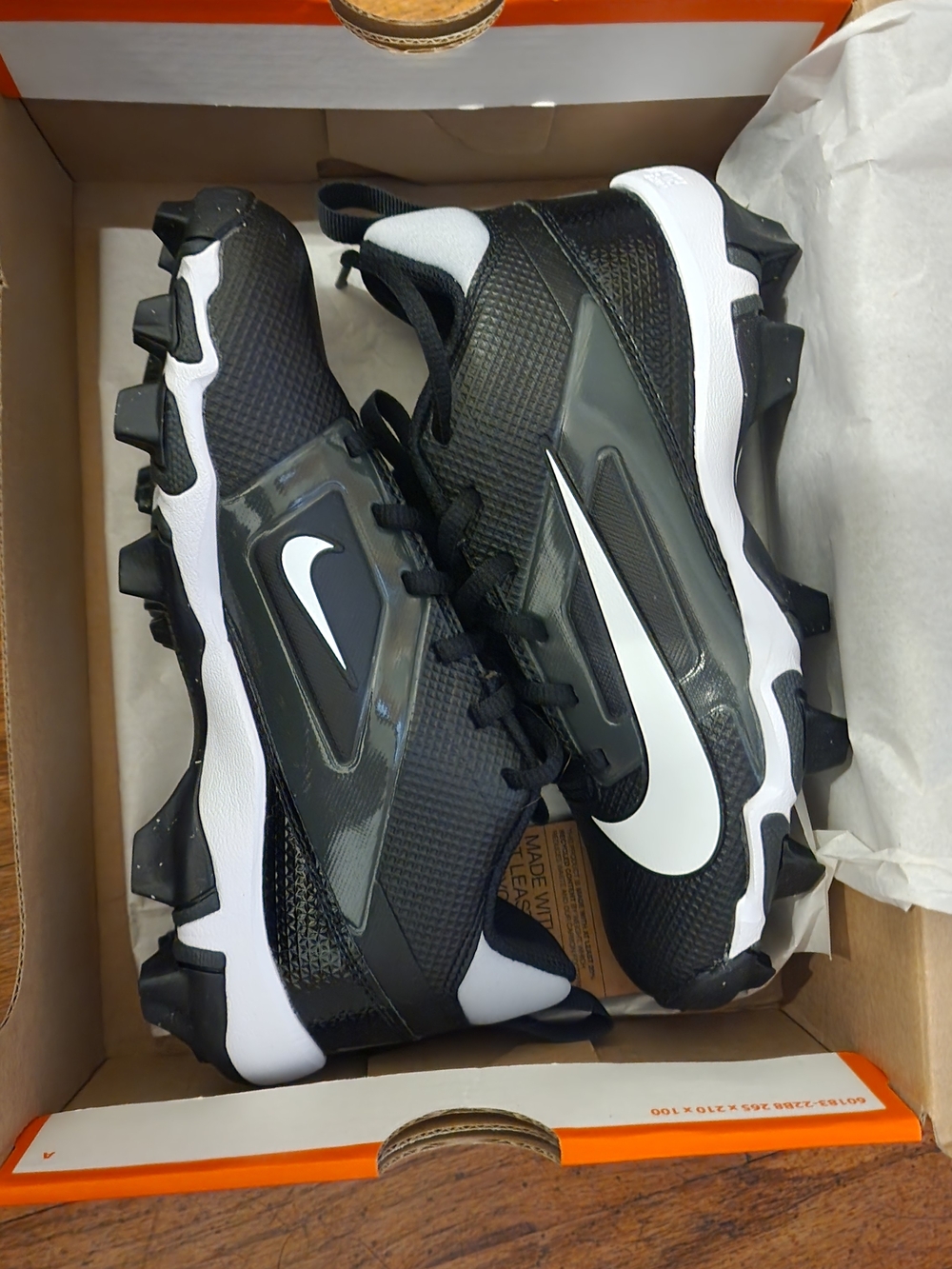 Nike Black and White Football Cleats with Bold Swoosh